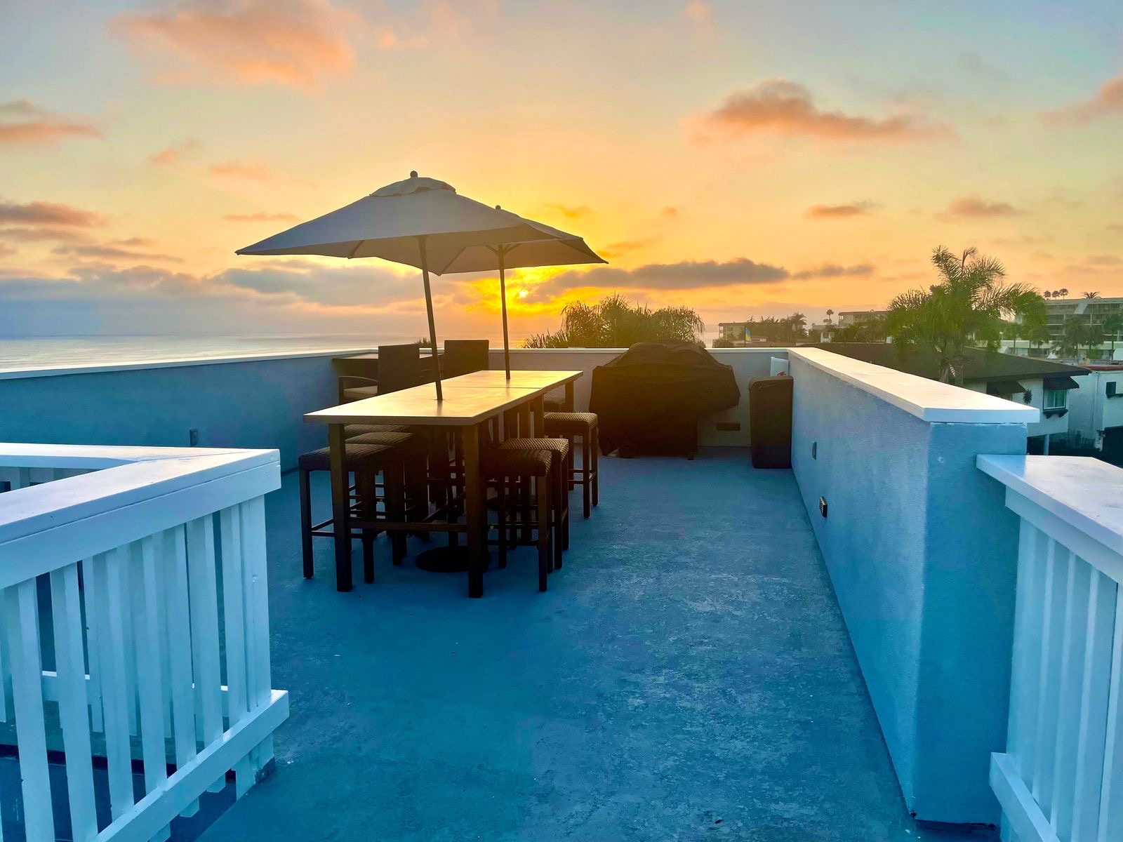 The Retreat (Unit E) — rooftop sunset